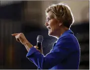  ?? CHARLIE NEIBERGAIL — THE ASSOCIATED PRESS ?? Under the health care plan that Sen. Elizabeth Warren unveiled Friday, private health insurance would be eliminated.
