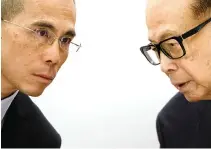  ??  ?? HONG KONG’s richest man Li Ka-shing (R), 89, and his son Victor speak during a press conference in Hong Kong on March 16. Li Ka-shing announced on March 16 he was stepping down as chairman of his flagship company CK Hutchison, marking the end of an era...