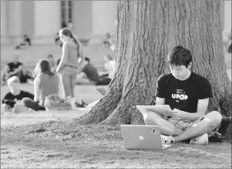  ?? Photos by Josh T. Reynolds for USA TODAY ?? No longer marginaliz­ed: Jonathan Chien, 19, says he believed the stereotype­s about MIT’S brainy student body.