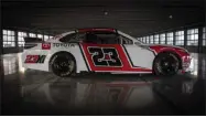  ?? HONS ?? This image provided by Toyota Racing, shows the new No. 23Toyota Camry at at Charlotte Motor Speedway, Saturday, Oct. 24, 2020, in Charlotte, N.C. Hall of Fame basketball player and Charlotte Hornets owner Michael Jordan expects to field a winning team when 23XI (pronounced twenty-three eleven) Racing begins NASCAR competitio­n next season. The car will be driven by Bubba Wallace and will be a Toyota in an alliance with Joe Gibbs Racing.
