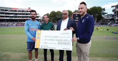  ?? PICTURE: CRICKET SOUTH Africa ?? TEAMWORK: From left: Virat Kohli, India captain; and Ali Sablay and Badr Kazi from Gift of the Givers; with Proteas captain Faf du Plessis. The cricket teams donated R100 000 to Gift of the Givers towards the drilling of boreholes in the...