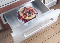  ??  ?? Thirty-inch outdoor warming drawer