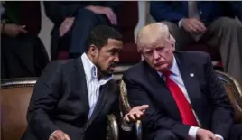  ?? Eric Thayer/The New York Times ?? Donald Trump speaks with Pastor Darrell Scott on Sept. 21, 2016, in Cleveland.