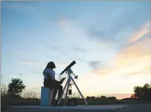  ?? CHRIS BUCK / THE NEW YORK TIMES ?? Jasmyn Taylor, 17, is a senior at Carbondale Community High School, in Carbondale, Ill. The college town will be among the best places to witness the Great American Eclipse next month as it whisks across the contiguous U.S., the first total solar...