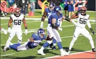  ?? Justin Casterline / Getty Images ?? Wayne Gallman (22) of the New York Giants stretches into the end zone for a touchdown during the first half against the Cincinnati Bengals at Paul Brown Stadium on Sunday in Cincinnati.