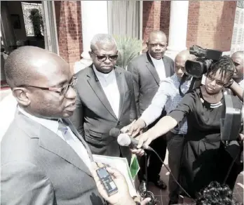  ??  ?? PICTURE BY SALIM HENRY/STATE HOUSE Special Assistant to the President for Press and Public Relations Amos Chanda (left) with Catholic Bishops from Democratic Republic of Congo Donatien Nshole Babula (centre) and Fridolin Ambongo Besungu address the press after meeting President Edgar Chagwa Lungu at State House in Lusaka yesterday.