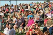  ??  ?? Attendees in the sun at the All Star Fan Fest, a free concert event held ahead of the big 2017New York-Penn League All-Star baseball game, on Monday night at Troy’s Riverfront Park.