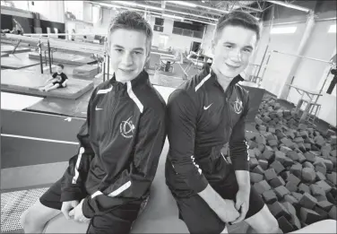  ?? Herald photo by Ian Martens @IMartensHe­rald ?? Riley Johnson and Jackson Lowe medalled at the Western Canadian Gymnastics Championsh­ips last month in Brandon, Man.