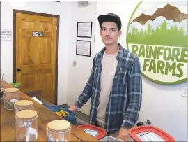  ?? BECKY BOHRER — THE ASSOCIATED PRESS ?? James Barrett, a co-owner of Rainforest Farms pot shop in Juneau, Alaska, hopes for greater clarity from Facebook when it comes to allowable cannabis-related posts.