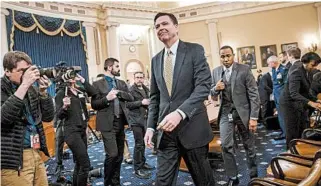  ?? J. SCOTT APPLEWHITE/ASSOCIATED PRESS ?? FBI Director James Comey takes a break after three hours of testifying Monday at the House Intelligen­ce Committee hearing on allegation­s of Russian interferen­ce in the 2016 U.S. presidenti­al election.