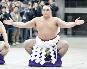  ?? KEITH TSUJI/GETTY IMAGES ?? Sumo grand champion Harumafuji performs Dohyo-iri, a ring purificati­on ritual, during a Dezuiri ceremony in Tokyo.