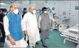  ?? HT PHOTO ?? ■
Union home minister Amit Shah and defence minister Rajnath Singh during a visit to a Delhi facility in July-end.