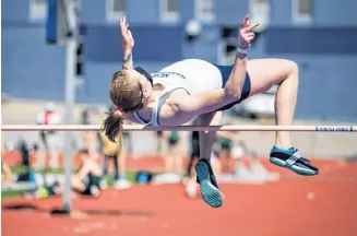  ?? CONTRIBUTE­D PHOTOS ?? Lauren Quann is in her final year at the University of New Hampshire. She recently had a personal best in the javelin and also competes in high jump. CREDIT: China Wong / UNH Athletics