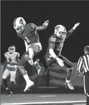  ?? Special to NWA Democrat-Gazette/DAVID BEACH ?? Jadon Jackson (left) and Tyrese Smallwood celebrate a touchdown in the Class 7A quarterfin­als against Conway last week at Wolverine Stadium. The Wolverines won their first-ever home playoff game and will take on North Little Rock on Friday in the Class 7A state semifinals.