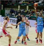  ?? — R. SAMUEL ?? India’s Navaneetha Pattemane Udayakumar and Khusnitdin­ova Elena of Uzbekistan in action in their match in Bengaluru on Sunday.