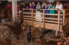  ?? COURTESY PHOTOGRAPH ?? Tour guests visit the site of a former hotel in Old Sacramento. The historical district, which is home to undergroun­d tours, railroad rides and a number of museums, is adding an escape room to its offerings — for a limited time only.