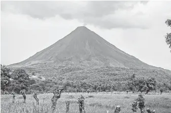  ??  ?? Arenal Volcano’s unexpected 2010 eruption reminded observers that Central Costa Rica’s most famous feature can be unpredicta­ble.