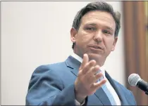  ?? JOE RAEDLE — GETTY IMAGES ?? Florida Gov. Ron DeSantis signed a bill requiring the state’s public colleges and universiti­es to survey students and faculty on their ideologica­l beliefs.