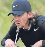  ??  ?? Tommy Fleetwood lines up a putt.