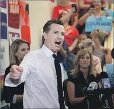  ?? Allen J. Schaben Los Angeles Times ?? D E M O C R AT Gavin Newsom, at a rally for a House hopeful Sept. 10 in Santa Clarita, pushes issues such as healthcare and education.