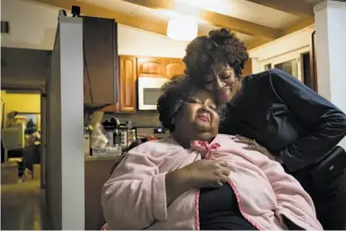  ?? Photos by Paul Kuroda / Special to The Chronicle ?? Lisa Johnson (left) and friend Alberta Simpson in the house Johnson almost lost as her problems piled up.