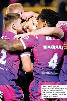  ?? ?? Sam Hewitt, centre, celebrates with team-mates after scoring a try during the Betfred Super League match at The Mend-A-Hose Jungle, Castleford