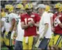  ?? MIKE ROEMER — THE ASSOCIATED PRESS FILE ?? In this file photo, Green Bay Packers quarterbac­k Aaron Rodgers shakes hands with new offensive coordinato­r Joe Philbin during the NFL football team’s Family Night practice in Green Bay, Wis. The Packers fired coach Mike McCarthy Sunday and made Philbin the interim head coach.