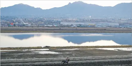  ?? ASSOCIATED PRESS FILE PHOTO ?? A rider exercises a horse March 5 at Sunland Park Race Track. Native American leaders worry that a proposed expansion to add more gambling options to nontribal racetracks and casinos will harm their economic security.