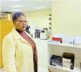  ?? Pictures: SUPPLIED ?? FIRE DAMAGE: Portfolio head for public safety Zukiswa Ralane at the Enoch Mgijima Local Municipali­ty traffic department offices that were recently refurbishe­d after a fire