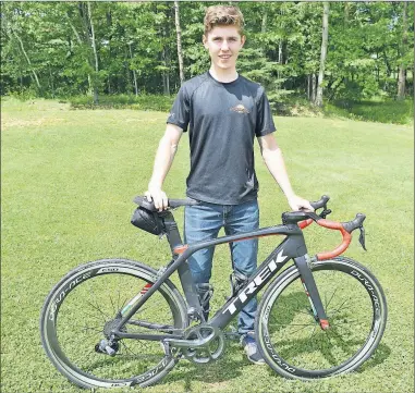  ??  ?? Tim Shea, who just graduated from Pictou Academy, will compete in mountain biking and cycling at the Canada Summer Games, which will begin in late July in Winnipeg. KEVIN ADSHADE/THE NEWS