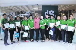  ??  ?? nDiana (center) with top performers for the first quarter of 2019 at the Diana Stalder Gateway Center in Cubao, Quezon City and with some young residents of the SOS Ayala Muntinlupa Alabang Village, which her company supports (bottom right).