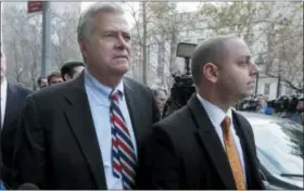  ?? RICHARD DREW — THE ASSOCIATED PRESS ?? In this file photo, former New York state Senate leader Dean Skelos, left, and his son Adam Skelos leave federal court, in New York. Skelos and his son have been convicted of bribery, wire fraud and extortion charges at their federal corruption trial on Tuesday.