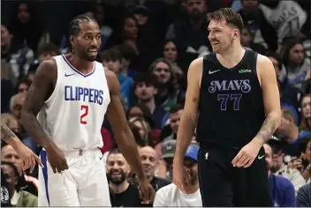  ?? LM OTERO — THE ASSOCIATED PRESS ?? The Clippers are hoping to have Kawhi Leonard, left, available today when they face Luka Doncic and the Mavericks.