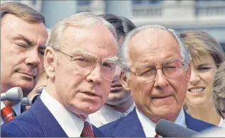  ??  ?? ASSOCIATED PRESS House Speaker Jim Wright of Texas (left) and House Minority Leader Robert Michel of Illinois speak to reporters outside the White House in 1987. Wright died Wednesday at age 92.