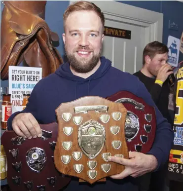  ?? Pictures: Kevin Slyfield ?? Shaun Thompson shows off his three trophies from the Bracknell Bees presentati­on evening