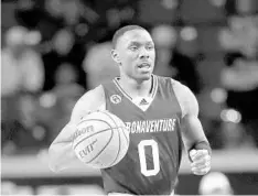  ?? NATE BILLINGS/AP ?? Erstwhile St. Bonaventur­e guard Kyle Lofton, shown on March 20 during an NIT game with Oklahoma and now bound for the Gators, averaged 38.1 minutes a game during four seasons.