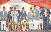  ?? REUTERS ?? KP Oli (4th L) takes oath on Monday.