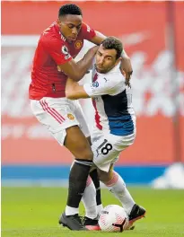  ?? Photo / AP ?? Manchester United's Anthony Martial (left), and Crystal Palace's James Mcarthur challenge for the ball.