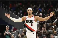  ?? NICK WASS — THE ASSOCIATED PRESS ?? Portland Trail Blazers guard Josh Hart (11) gestures after he made a 3-pointer during the second half of an NBA basketball game against the Washington Wizards, Friday, Feb. 3, 2023, in Washington. The Trail Blazers won 124116.