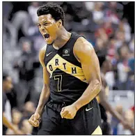  ??  ?? Toronto Raptors guard Kyle Lowry AP/ALEX BRANDON celebrates during the second half Friday night against the Washington Wizards in Washington.