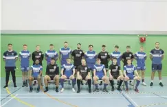  ??  ?? SIDE BY SIDE: Rugby Developmen­t Officer Andy Holleyhead with the Halifax Panthers Academy men’s team. Pic: Bruce Fitzgerald