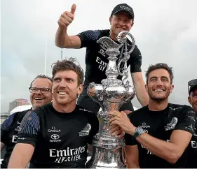  ?? GETTY IMAGES ?? Peter Burling and Blair Tuke with the America’s Cup.