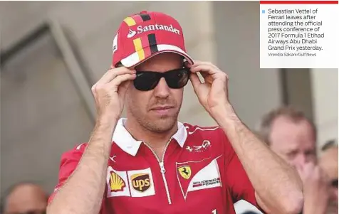  ?? Virendra Saklani/Gulf News ?? Sebastian Vettel of Ferrari leaves after attending the official press conference of 2017 Formula 1 Etihad Airways Abu Dhabi Grand Prix yesterday.