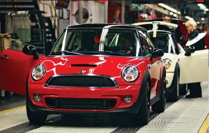  ??  ?? Endangered: A new Mini rolls off the production line at the Cowley factory, which could close