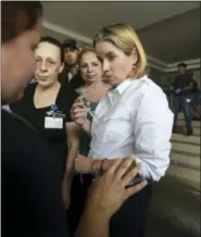  ?? AP PHOTO/CARLOS GIUSTI ?? Mayor Carmen Yulin Cruz arrives at San Francisco hospital in Rio Piedras area of San Juan, Puerto Rico, Saturday, Sept. 30, 2017, as about 35 patients are evacuated after the failure of an electrical plant.