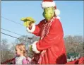  ?? Doug Walker, File ?? The Grinch was a crowd favorite in the 2019 Lindale Christmas parade.