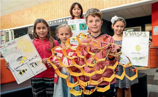  ?? PHOTO: MARION VAN DIJK/FAIRFAX NZ ?? Hampden Street School pupils, Maie Howse, 8, Holly Adams, 8, Taemen Lee, 8, middle back, Toby Dukes, 7, Sophia Eagle, 8, with their wasp projects.