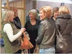  ??  ?? Lisa Ciaravino, left, Geri Kuclo, Barb DeGrandcha­mp, Sandy Balone, Cheryl Fudge and Darlene Tuladzieck­i catch up while they meet at the Rochester Hills Public Library. “It really does mean a lot,” said Fudge of Chesterfie­ld Township of the group’s bond. “You know these people are there for you.”