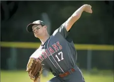  ??  ?? West Allegheny's Michael Crawford delivers a pitch during a game Monday against Chartiers Valley. West Allegheny won the game, 7-1.