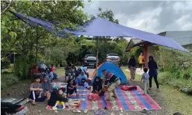  ?? Photograph: Adi Renaldi/The Guardian ?? Residents who still fear aftershock­s are setting up makeshift tents for their families.